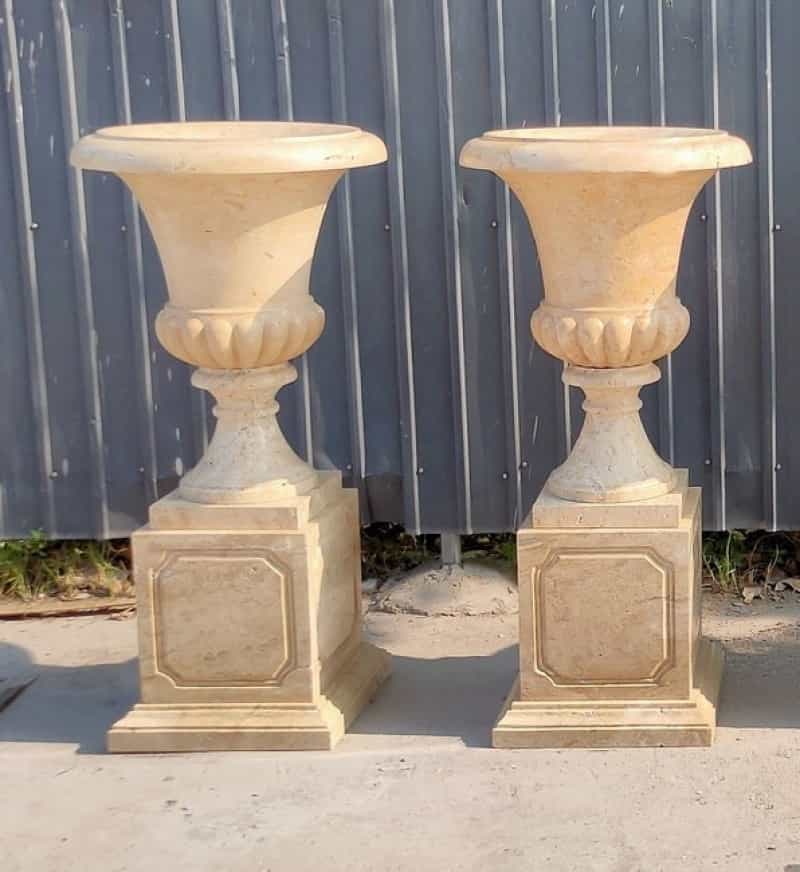 Pair Of Marble Urns On Base